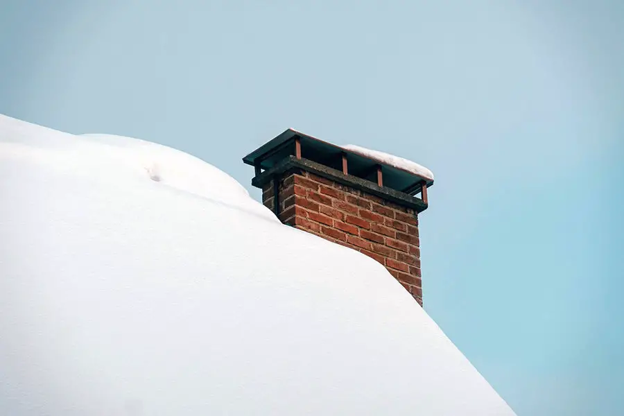 chimney cap in snow